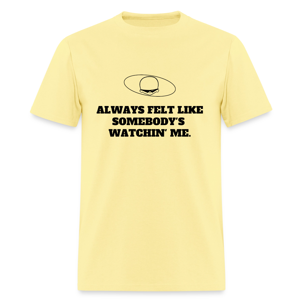 1980s "ALWAYS FELT LIKE SOMEBODY'S WATCHIN' ME." Pop Progeny T-Shirt (Dark on Light) - cornsilk